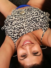 Busty Latin MILF Sofia Reyes spreads her pussy lips.